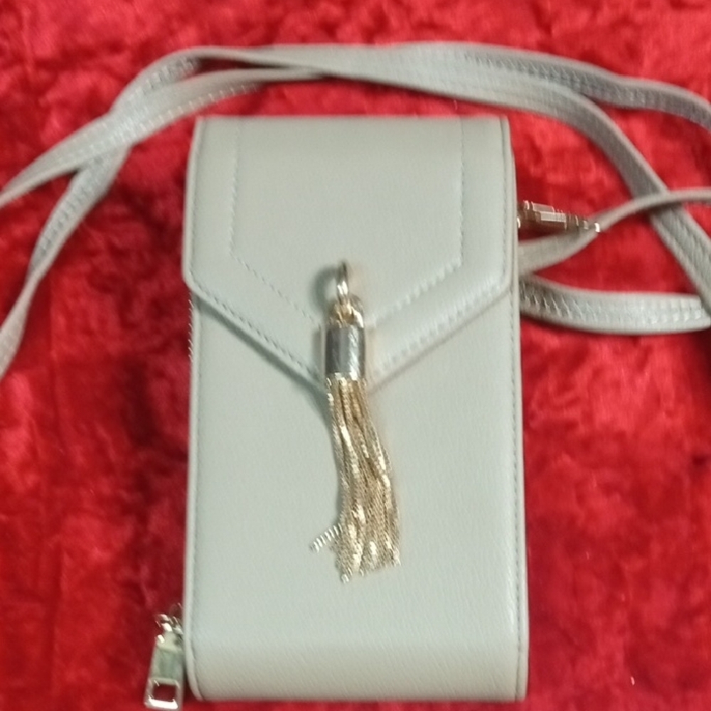 Elegant Cream Crossbody Bag with Tassel